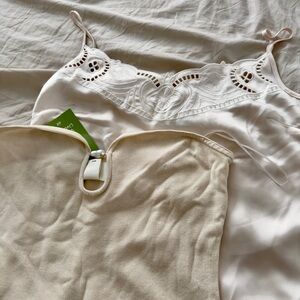 White Lace Trim Top and Pearly White Strapless Top. Never worn! $15 for both!